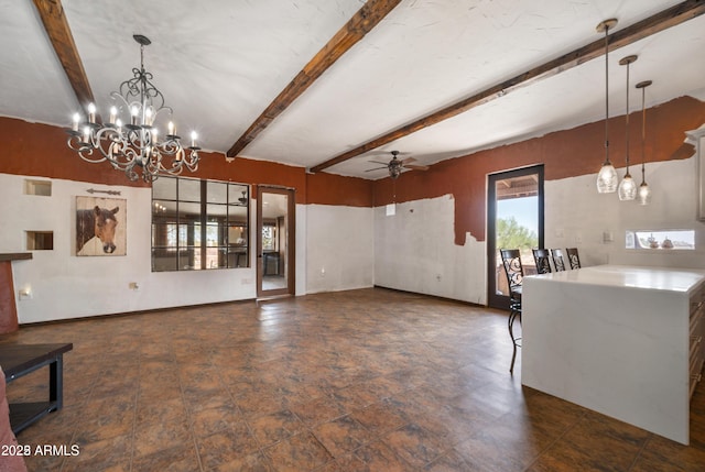 unfurnished dining area with baseboards, beam ceiling, and ceiling fan with notable chandelier