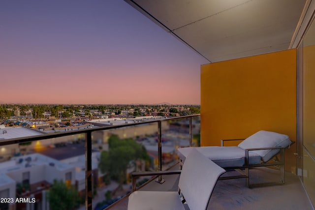 view of balcony at dusk