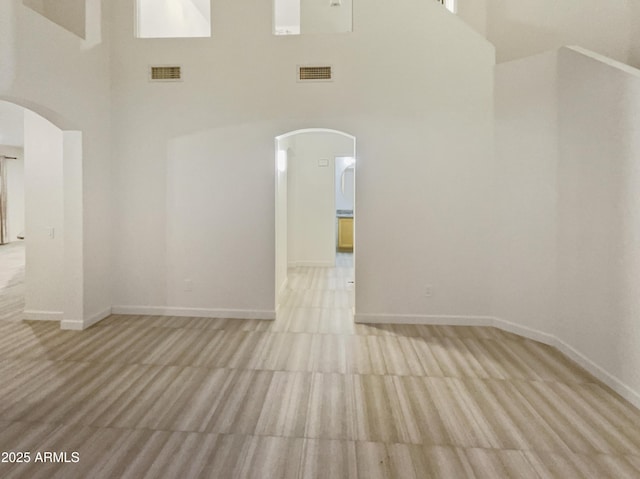 13033 W Avalon Dr, Avondale, AZ 85392 - empty room with a towering ceiling
