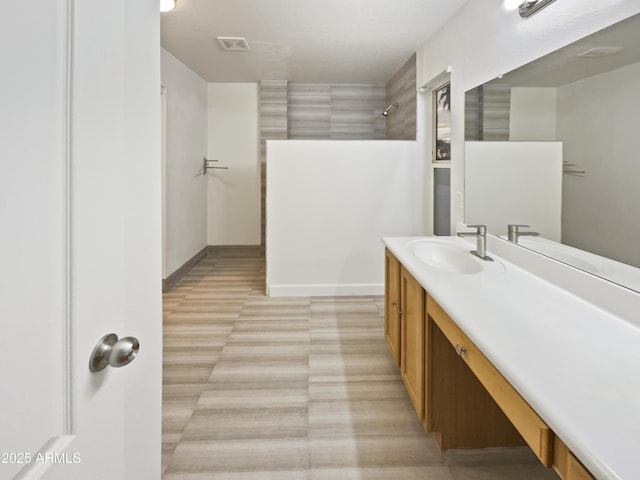 13033 W Avalon Dr, Avondale, AZ 85392 - bathroom featuring a shower and vanity