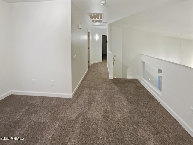 13033 W Avalon Dr, Avondale, AZ 85392 - interior space featuring dark colored carpet