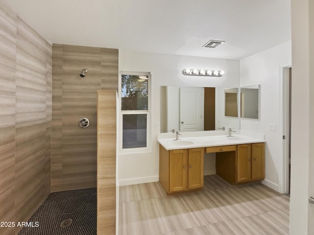 13033 W Avalon Dr, Avondale, AZ 85392 - bathroom with vanity and tiled shower