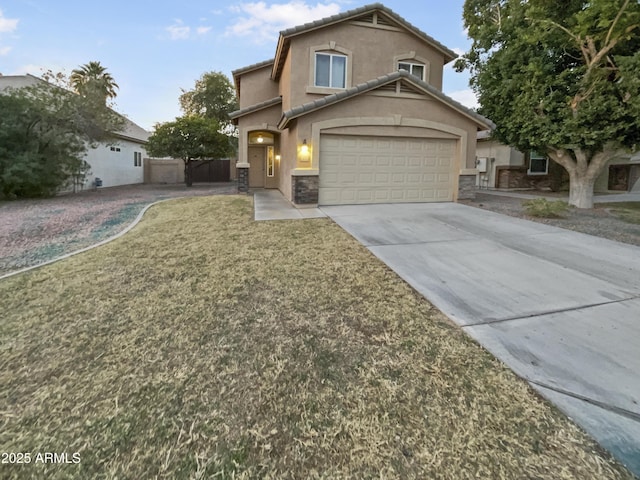 13033 W Avalon Dr, Avondale, AZ 85392 - view of front property featuring a front lawn and a garage