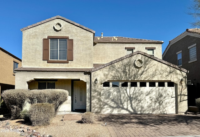 view of front of property with a garage