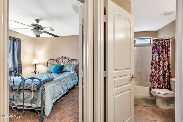 tiled bedroom with ceiling fan