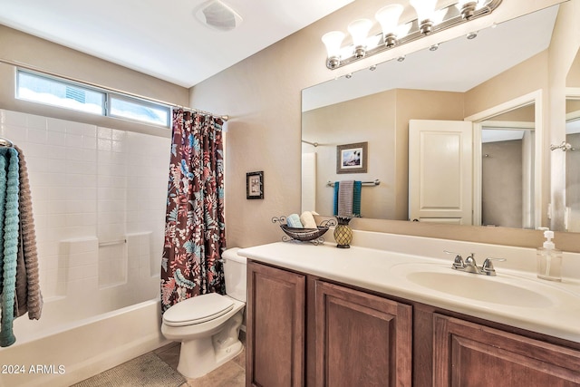 full bathroom featuring tile patterned flooring, vanity, toilet, and shower / bath combination with curtain