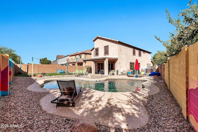 view of swimming pool with a patio area