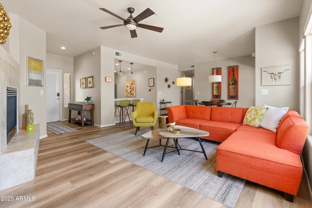 19700 N 76th St Unit 1038, Scottsdale, AZ 85255 - living room with light wood-style floors, ceiling fan, and recessed lighting