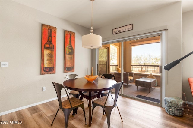 19700 N 76th St Unit 1038, Scottsdale, AZ 85255 - dining space featuring light wood finished floors and baseboards
