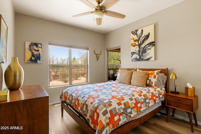 19700 N 76th St Unit 1038, Scottsdale, AZ 85255 - bedroom featuring wood finished floors and ceiling fan