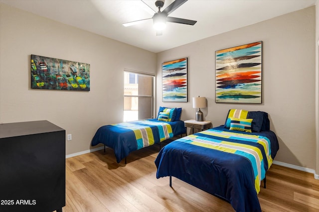 19700 N 76th St Unit 1038, Scottsdale, AZ 85255 - bedroom featuring wood finished floors and a ceiling fan
