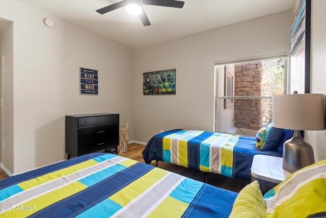 19700 N 76th St Unit 1038, Scottsdale, AZ 85255 - bedroom with wood finished floors and a ceiling fan