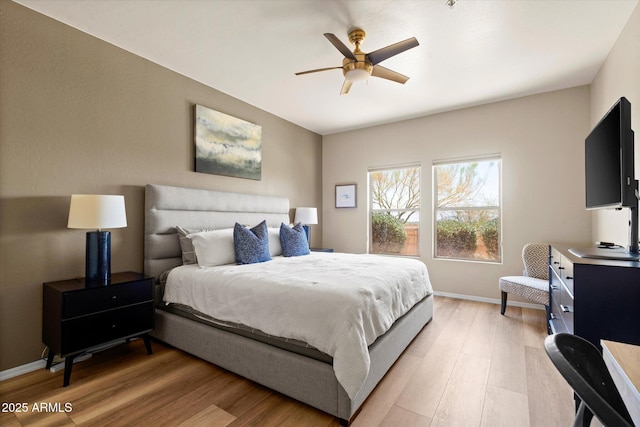19700 N 76th St Unit 1038, Scottsdale, AZ 85255 - bedroom with light wood finished floors and a ceiling fan