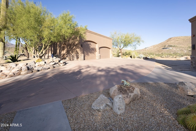 view of side of property featuring a mountain view