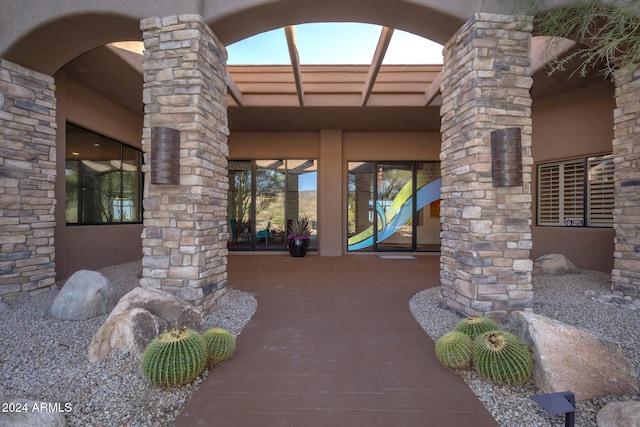 view of home's community with a patio area