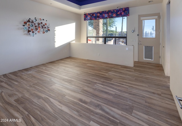 spare room featuring hardwood / wood-style flooring