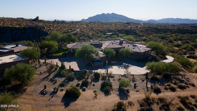 drone / aerial view featuring a mountain view