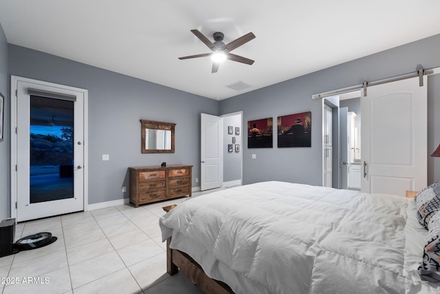 bedroom with access to outside, a barn door, ceiling fan, and light tile patterned flooring