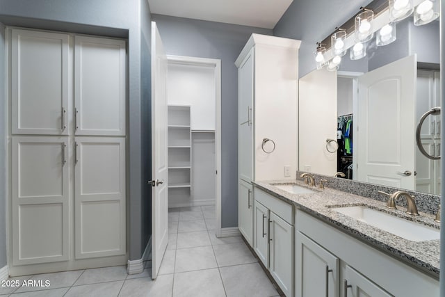 bathroom featuring vanity and tile patterned floors