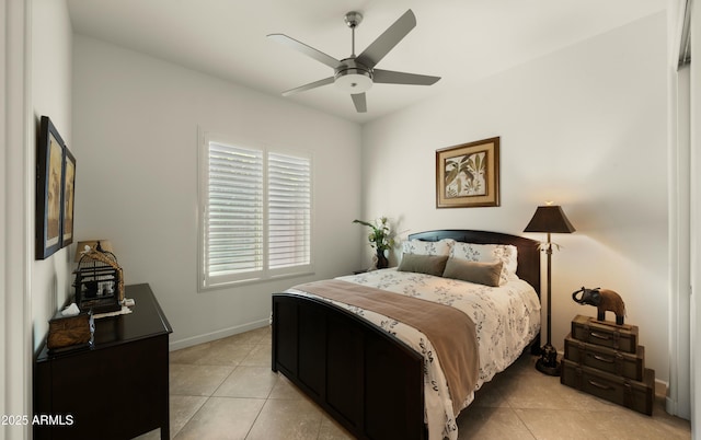 bedroom featuring ceiling fan and light tile patterned flooring