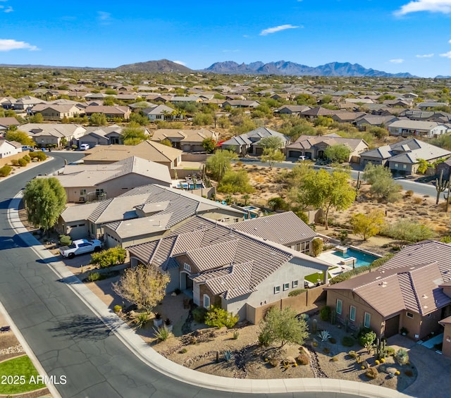 bird's eye view with a mountain view