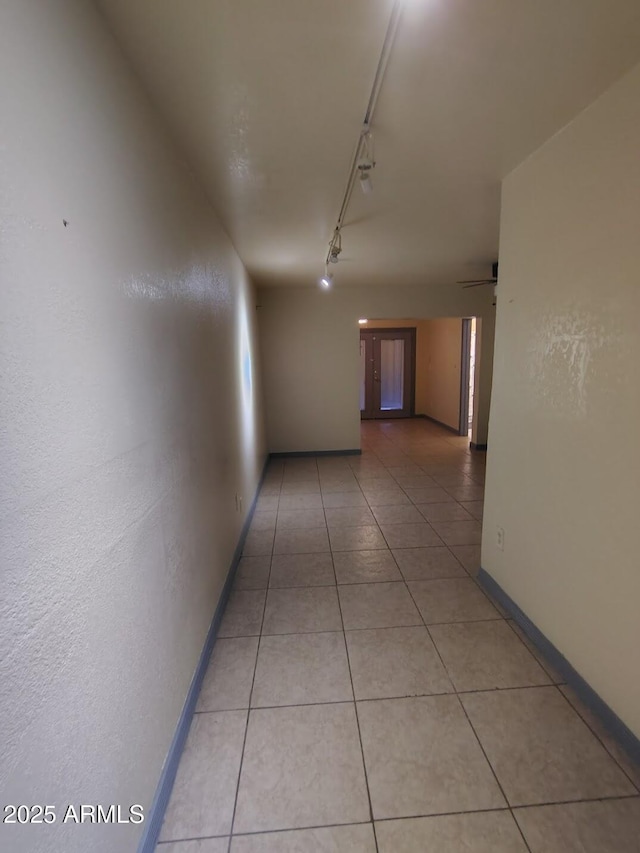 126 N 9th Ave, Phoenix, AZ 85007 - hallway featuring light tile patterned floors and rail lighting