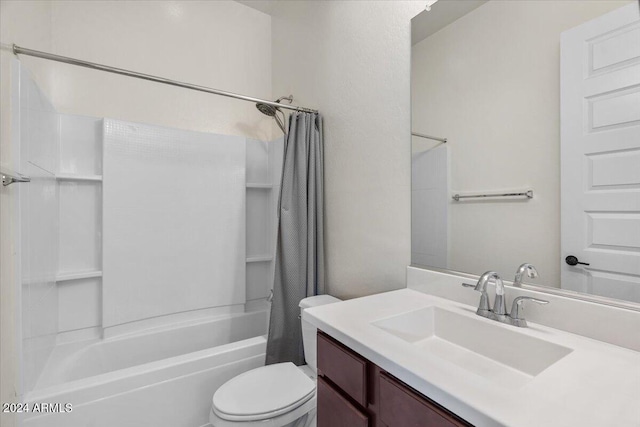 full bathroom with shower / bath combination with curtain, vanity, and toilet