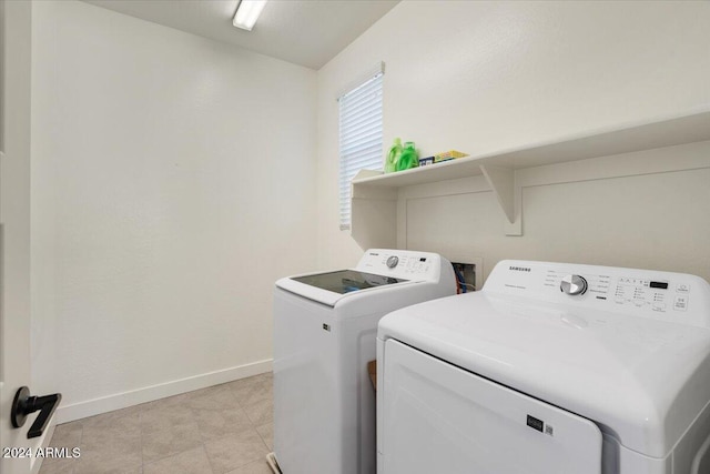 laundry room with washer and clothes dryer