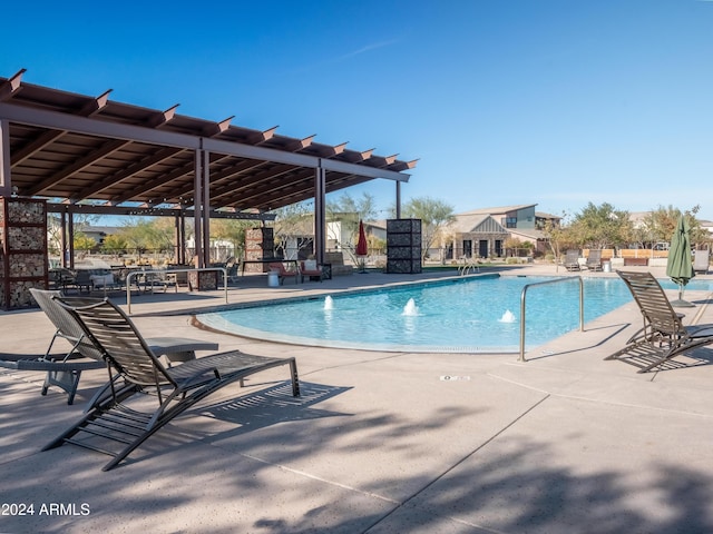 view of pool featuring a patio area