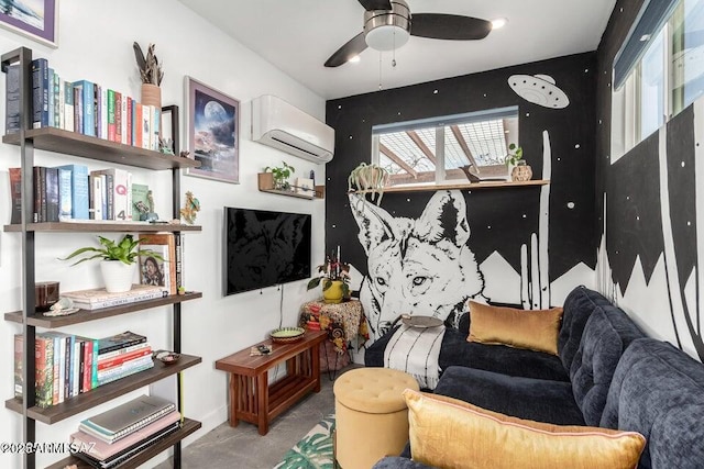 living room with ceiling fan and a wall mounted AC