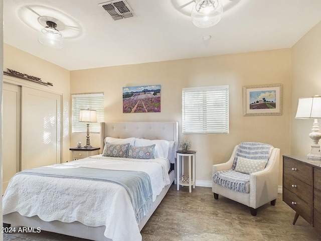 bedroom featuring hardwood / wood-style flooring