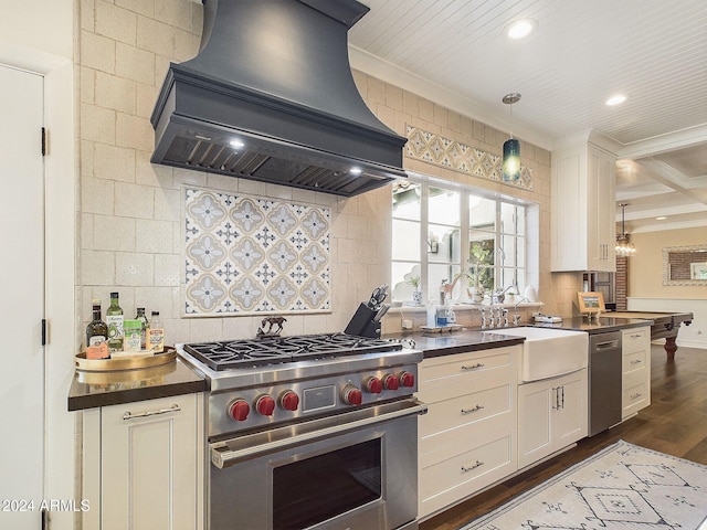 kitchen with stainless steel appliances, ornamental molding, decorative light fixtures, premium range hood, and dark hardwood / wood-style flooring