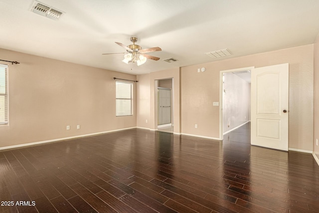 9207 W Kirby Ave, Tolleson, AZ 85353 - spare room with ceiling fan, baseboards, and wood finished floors