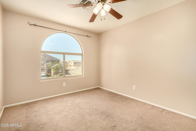 9207 W Kirby Ave, Tolleson, AZ 85353 - carpeted spare room with a ceiling fan and baseboards