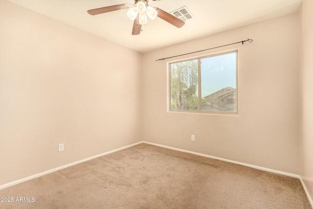 9207 W Kirby Ave, Tolleson, AZ 85353 - empty room with carpet floors, baseboards, and ceiling fan