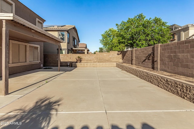 9207 W Kirby Ave, Tolleson, AZ 85353 - fenced backyard featuring a patio