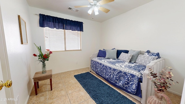 884 W 15th Ave, Apache Junction, AZ 85120 - tiled bedroom with baseboards and ceiling fan