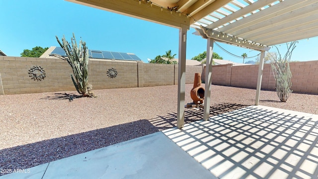 884 W 15th Ave, Apache Junction, AZ 85120 - view of patio featuring a pergola and a fenced backyard