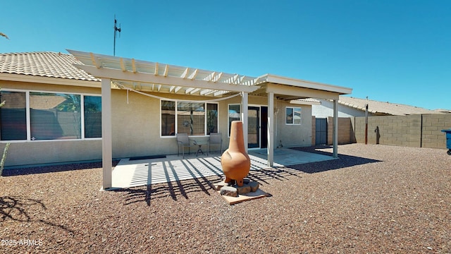 884 W 15th Ave, Apache Junction, AZ 85120 - back of property featuring a pergola, fence, and a patio