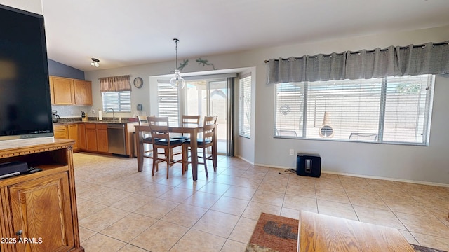 884 W 15th Ave, Apache Junction, AZ 85120 - dining room with light tile patterned floors, baseboards, and lofted ceiling
