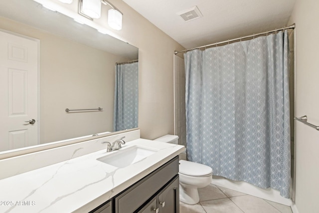 5998 N 78th St Unit 116, Scottsdale, AZ 85250 - bathroom with toilet, a shower with curtain, tile patterned floors, visible vents, and vanity