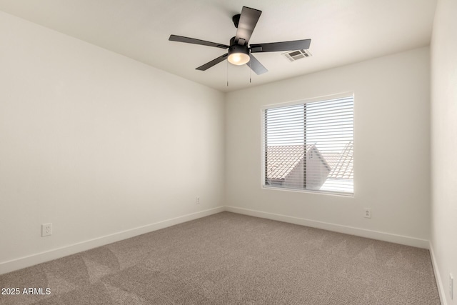 8928 E Crescent Ave, Mesa, AZ 85208 - unfurnished room featuring baseboards, light carpet, and a ceiling fan