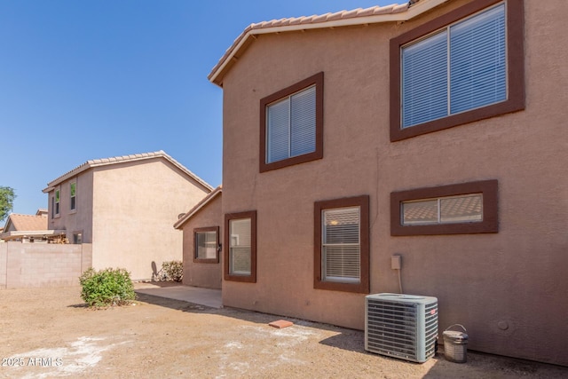 8928 E Crescent Ave, Mesa, AZ 85208 - rear view of property with central AC unit, a patio, and stucco siding