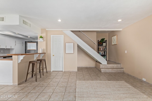 interior space featuring tile patterned flooring