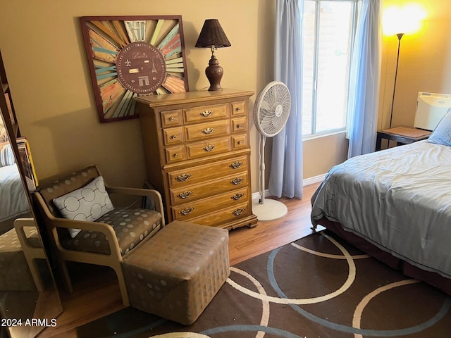 bedroom featuring wood-type flooring