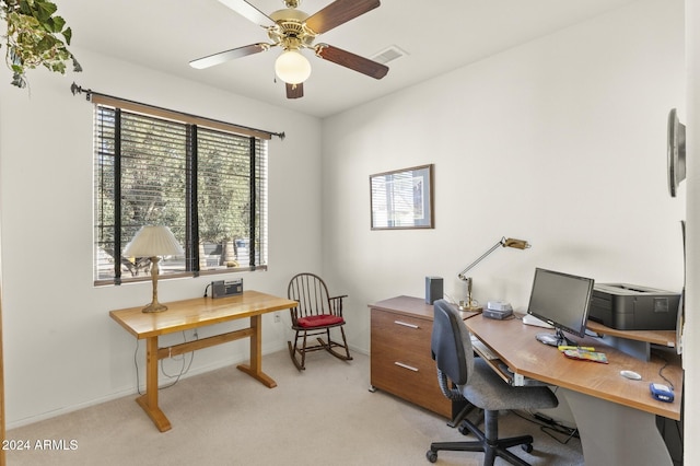 office area featuring light colored carpet and ceiling fan