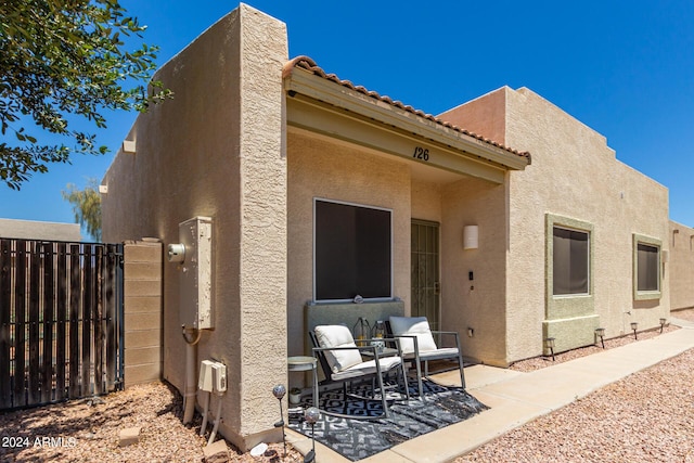 rear view of house featuring a patio