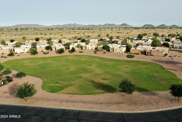 birds eye view of property with a mountain view