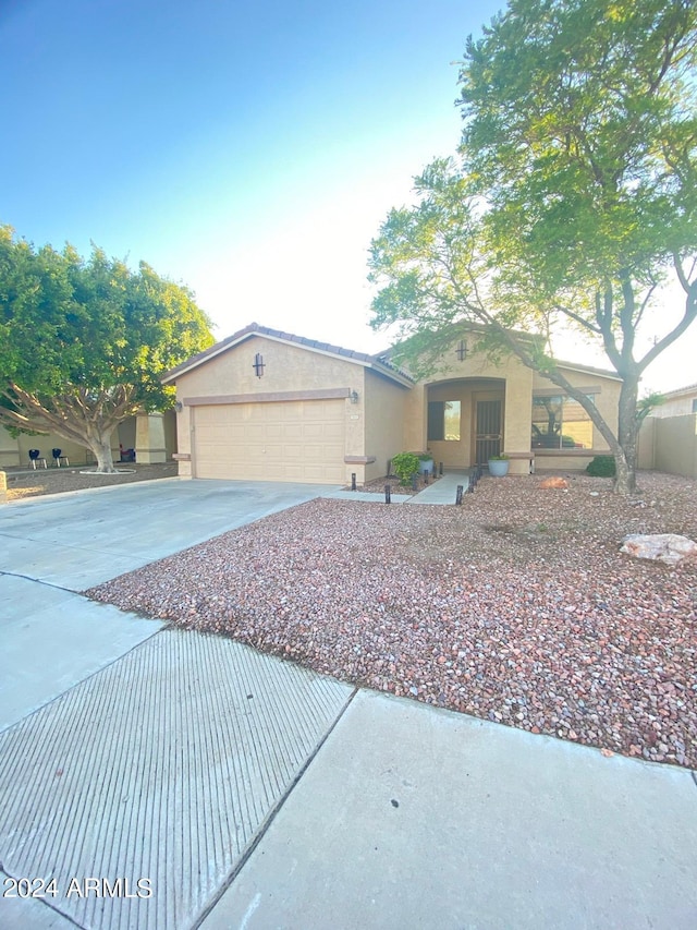 view of front of home with a garage