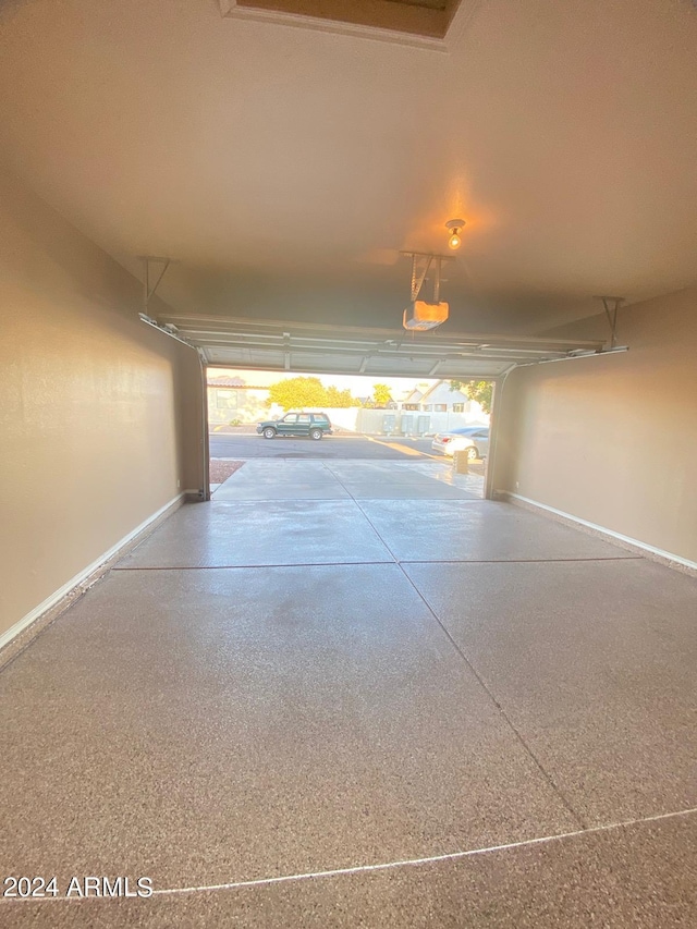 garage featuring a garage door opener